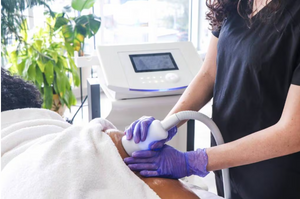 A female customer receiving a Cryo Lifting treatment. Cryo Lifting reduces cellulite and tightens, tones, and firms the skin.