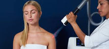 Load image into Gallery viewer, A customer doing a localized cryotherapy session on their shoulder. Reduce pain and inflammation. Recover and heal faster.